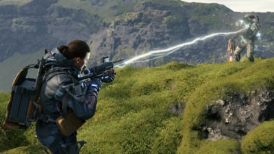 Death Stranding screenshot showing Sam using an electrical weapon on an enemy