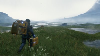 Death Stranding screenshot showing Sam walking in an area of grass and streams