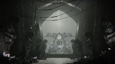 Snimka zaslona Destiny 2, epizoda Heresy, čin 2 prikazuje slabo osvijetljenu dvoranu s figurama od kamena sa svake strane puta koji vodi do kraja dvorane, na kraju dvorane nalazi se svijetleća kugla okružena stijenama.