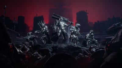 Destiny 2 : Dans la lumière – Capture d'écran montrant cinq Gardiens se dressant fièrement sous un ciel rouge sombre