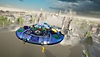 Destroy All Humans! 2 screenshot showing a flying saucer observing Tower Bridge as it crumbles into the river Thames