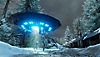 《Destroy All Humans!2》螢幕截圖，顯示外星人Crypto在一個滿布白雪的環境中在飛碟上朝下方發射光束