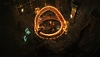 Diablo IV στιγμιότυπο με έναν ήρωα να κάνει μάγια σε ένα γιγάντιο μαγικό ερπετό