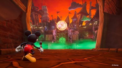 لقطة شاشة من لعبة Disney Epic Mickey: Rebrushed تعرض Mickey وهو يوشك دخول بيئة مريبة يغطيها الضباب الأخضر