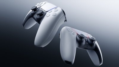 DualSense controllers on grey background
