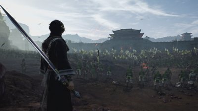 Dynasty Warriors: Origins screenshot showing the player standing at the back of a huge army