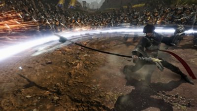 Dynasty Warriors: Origins screenshot showing the player character performing a sweeping attack towards many enemies