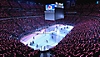 EA Sports NHL 23 – spilloversikt med bilde av lag som skøyter i arenaen.
