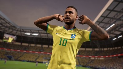 eFootball 2024 – zrzut ekranu przedstawiający piłkarza przykładającego ręce do uszu.