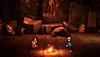 《百英雄傳》螢幕截圖，呈現2名英雄平靜地坐在營火旁。