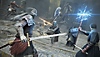 Snímek obrazovky ze hry Elden Ring zobrazující boj v režimu PvP.