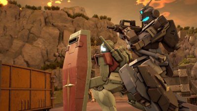 لقطة شاشة من لعبة Gundam Evolution تظهر فيها البذلة المتنقلة تمسك درعًا