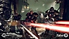Captura de pantalla de Fallout 76, que muestra a tres personajes disparando láseres rojos