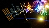 Fantavision 202X screenshot showing a spectacular fireworks display in space near an orbiting satellite