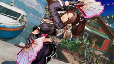 Fatal Fury: City of Wolves screenshot showing Mai Shiranui posing with two fans.