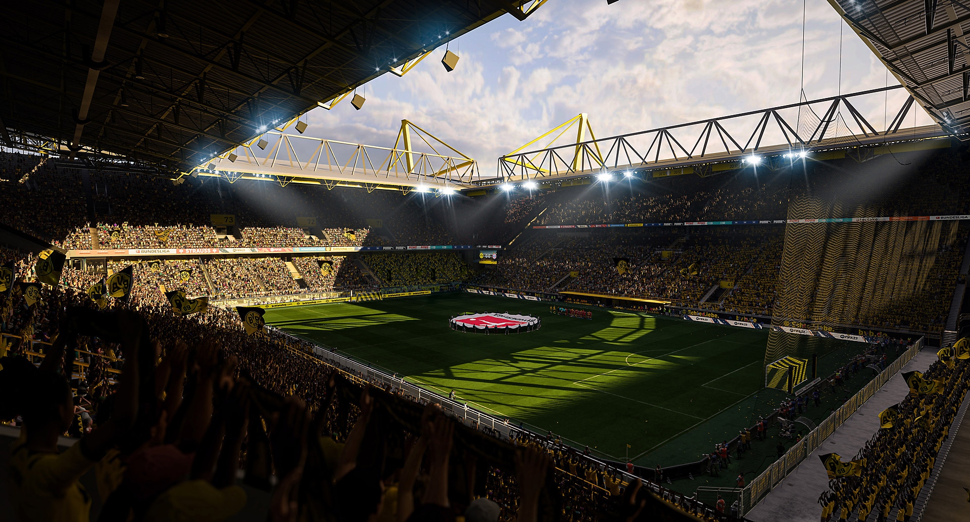 Zrzut ekranu z gry EA Sports FIFA 23 pokazujący stadion piłkarski w słońcu