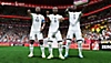 EA Sports FIFA 23 – snímek obrazovky zobrazující oslavující tým na mistrovství světa