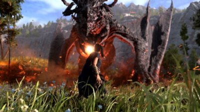 Forspoken screenshot showing Frey facing-off against a dragon-like creature