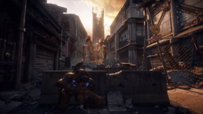 Gears of War: Reloaded – Capture d’écran montrant Marcus Fenix se mettant à couvert à l'approche d'une grande créature extraterrestre