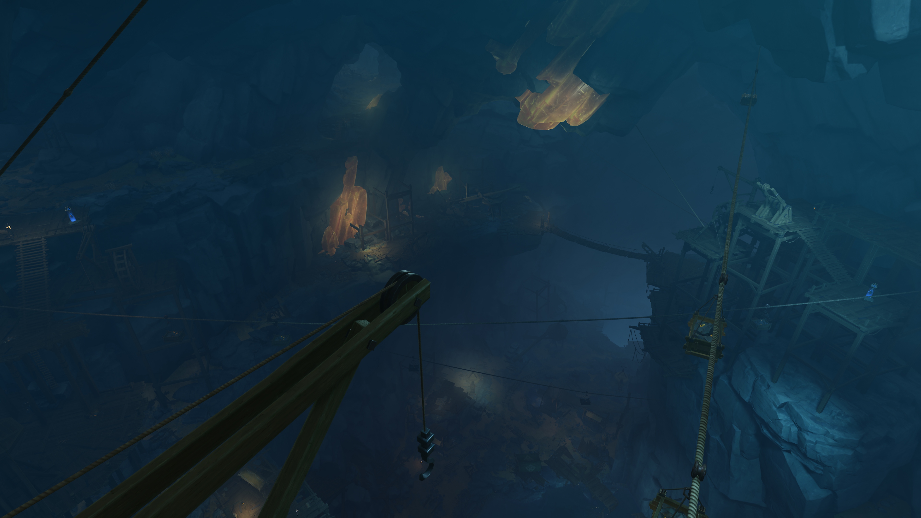 《原神》：2.6更新截屏，展示阴暗地底矿坑的场景，其中有闪闪发亮的水晶藏在岩石间