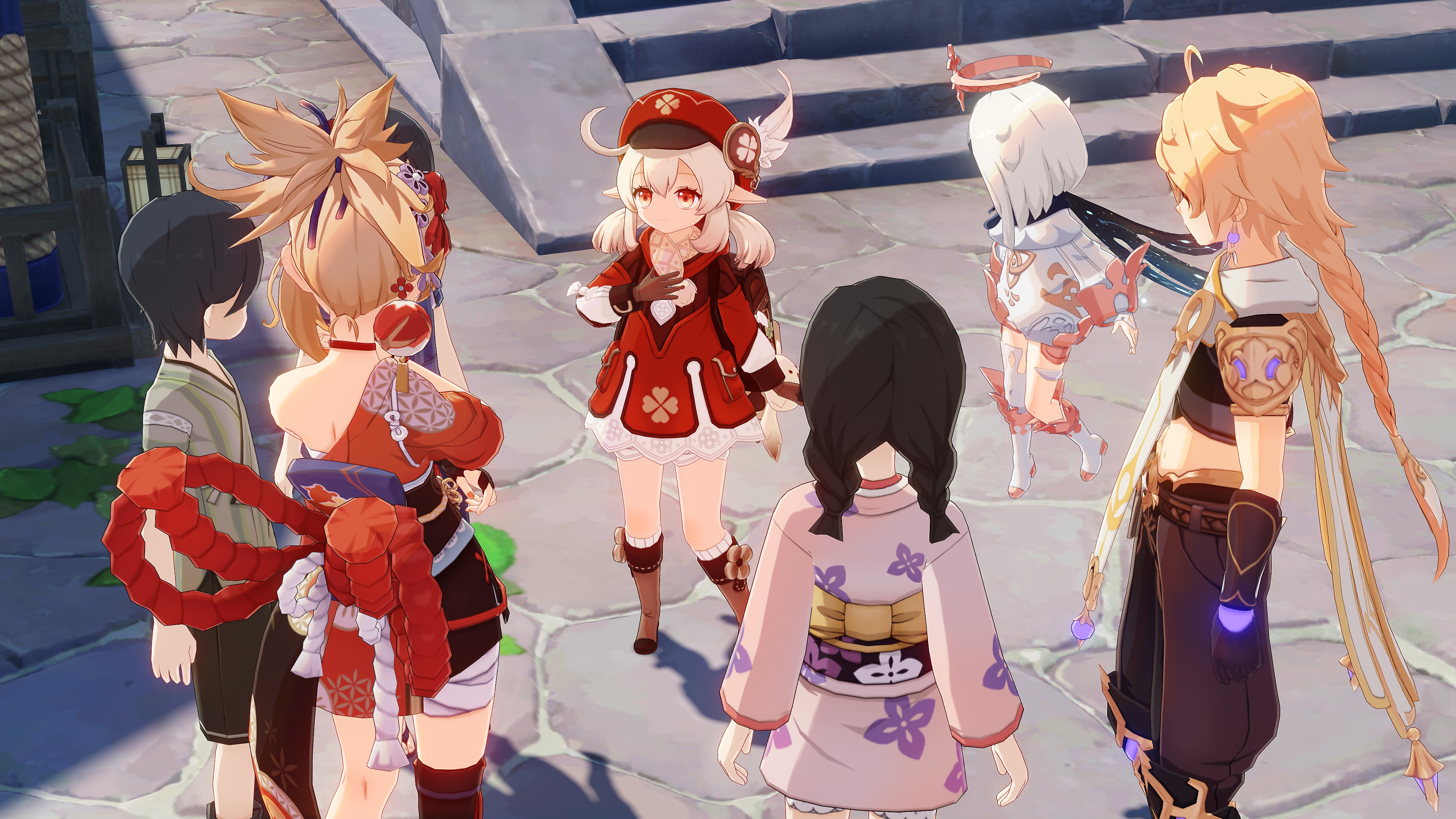 Impacto de GenShin: Captura de pantalla de Actualización 2.6 que muestra a un grupo de personajes parados en un círculo
