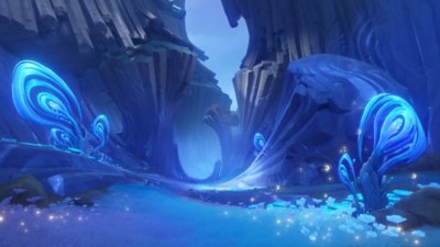 Genshin Impact 6.0 screenshot showing a chasm with basalt columns and swirling blue foliage 