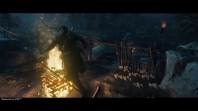 Ghost of Tsushima - Traversée d'un pont en feu