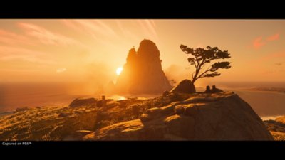 ghost of tsushima — pôr do sol atrás de montanha