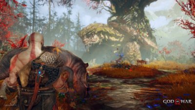god of war pc screenshot showing Kratos carrying a boar