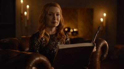 Picture of a woman about to read from a book