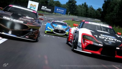Gran Turismo 7 screenshot showing a Mazda, Genesis and Toyota battling on a race track