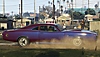 Captura de pantalla de Grand Theft Auto V con un muscle car morado quemando rueda