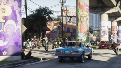 Grand Theft Auto VI screenshot showing a lively urban area covered in graffiti