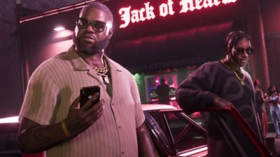 Grand Theft Auto VI screenshot showing the characters Boobie and Dre'Quan getting out of a car