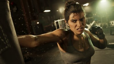 Grand Theft Auto VI screenshot showing Lucia using a punching bag