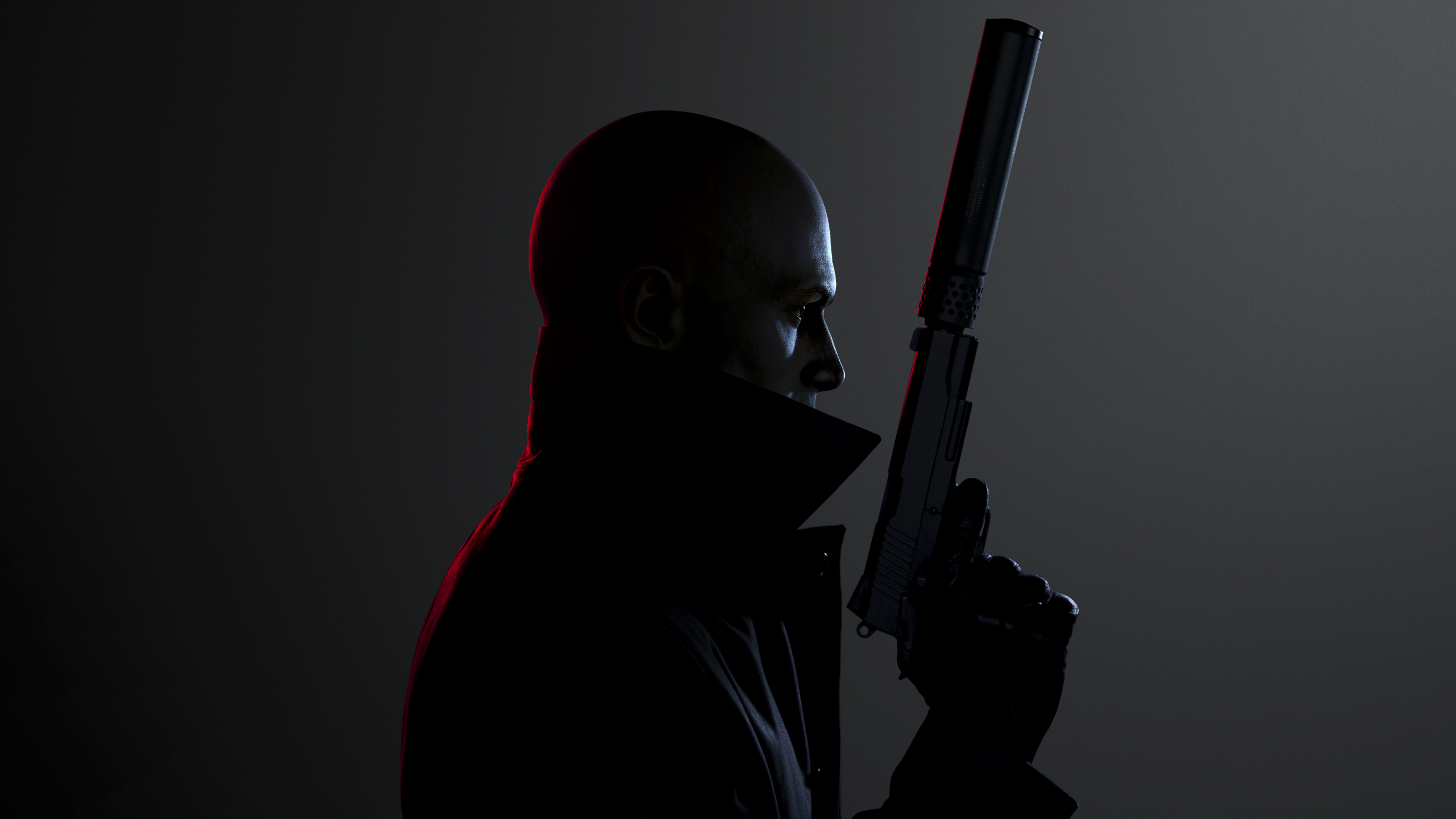 Hitman 3 key art featuring main character Agent 47 in profile holding a silenced pistol.