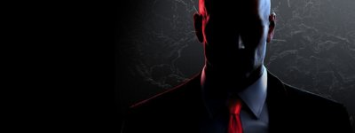 Illustration principale de Hitman 3 montrant le visage de l'agent 47 dans l'ombre