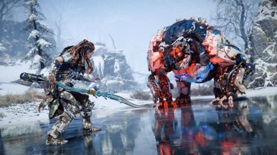 Horizon Zero Dawn Remastered screenshot showing Aloy confronting a machine in a snowy landscape