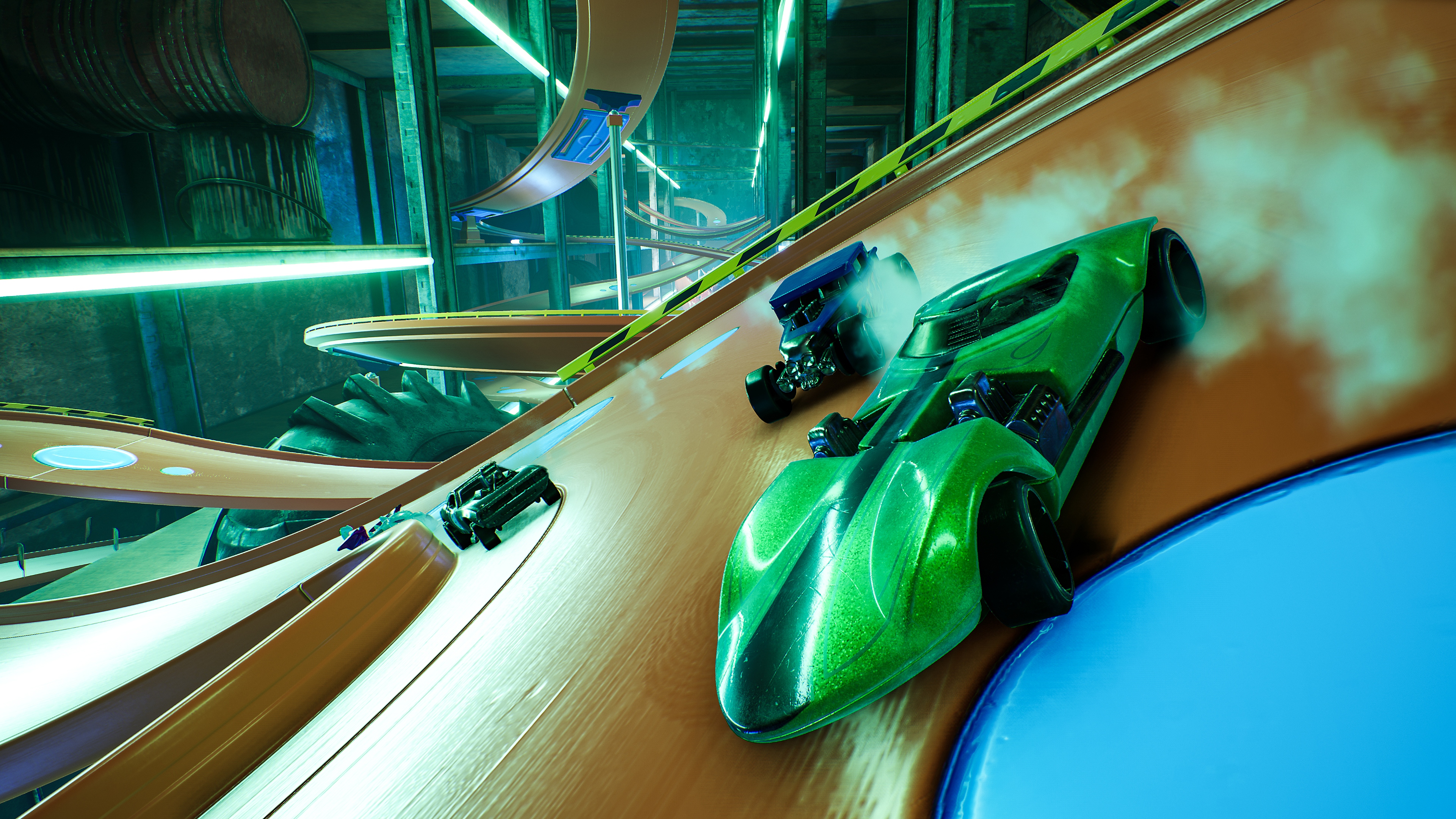 Hot Wheels Unleashed image of cars racing with track in the background.