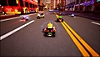 《KartRider: Drift》截屏，显示八辆卡丁车在城市街道竞速，一辆观光巴士从旁边经过
