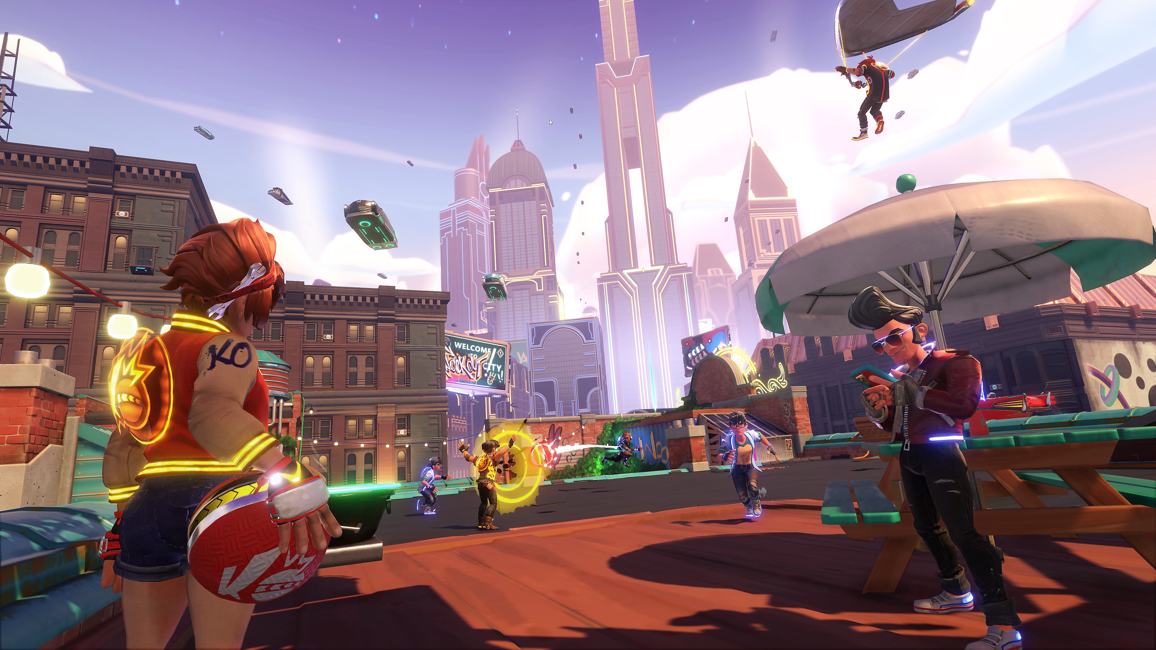 Knockout City – Screenshot mit Spielern vor einer Stadt-Skyline