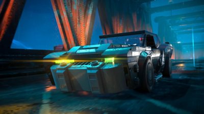 LEGO Batman drives the Tumbler across a bridge.