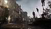 Snimak ekrana igre Lies of P na kom je prikazana ulica s redom lutki nataknutih na šiljke