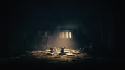 Ein Screenshot aus Little Nightmares III, der Low und Alone vor einem Ofen zeigt