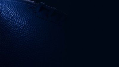 Hintergrundbild, das eine Nahaufnahme eines Footballs und dessen Textur zeigt
