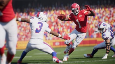 لقطة شاشة من لعبة Madden NFL 26 تظهر لاعبًا يرتدي زيًا أحمر يتفادى تدخل لاعب يرتدي زيًا أبيض