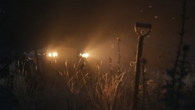 Mafia: The Old Country showing a shovel in a field, illuminated by car headlights