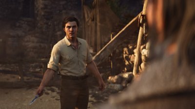 Mafia: The Old Country showing the protagonist holding a knife