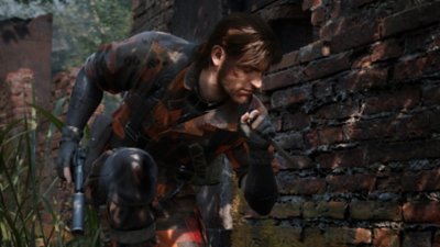 Metal Gear Solid Delta: Snake Eater screenshot showing Snake crouched down