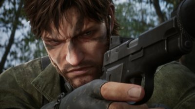 Metal Gear Solid Delta: Snake Eater screenshot showing Snake holding a pistol